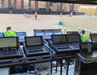 Professional lighting control consoles at outdoor event venue