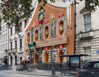 Giant gingerbread house storefront in London street