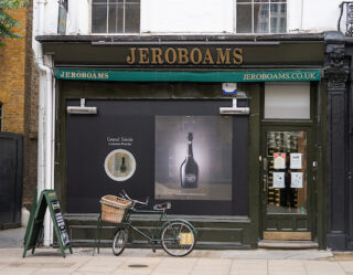 Jeroboams wine shop storefront with vintage bicycle