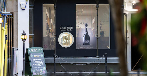 Wine shop storefront with Grand Siècle display